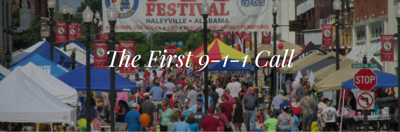Wide view of tents and crowds of people attending the Haleyville 911 Festial in Alabama
